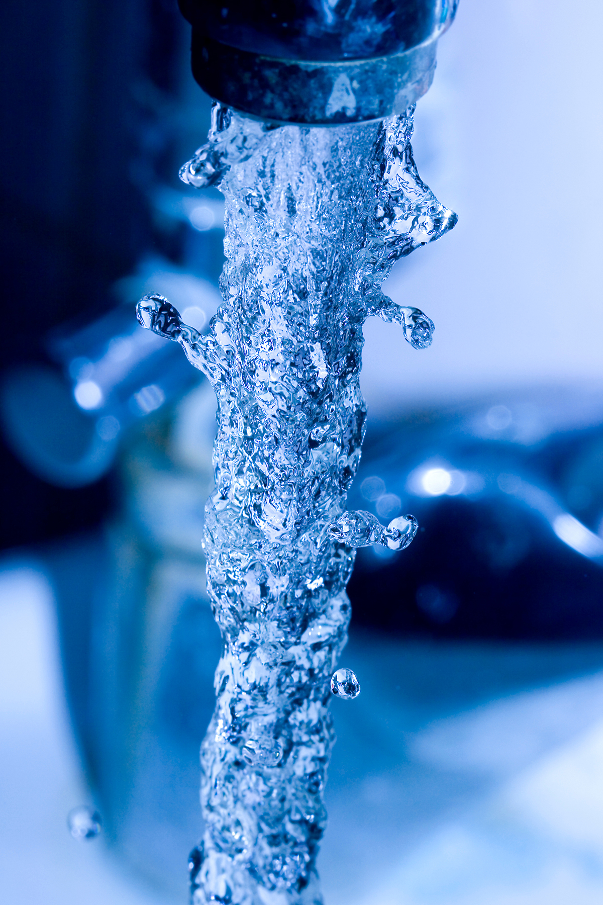 Water coming out of a faucet